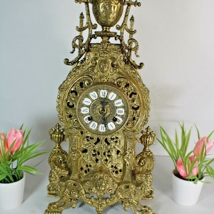 Vintage bronze clock lions caryatid putti head clock