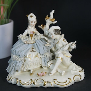 Antique german marked porcelain small porcelain lace group statue