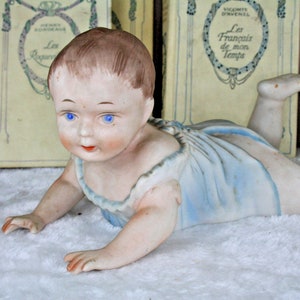 Gorgeous rare antique german bisque porcelain baby figurine crawling