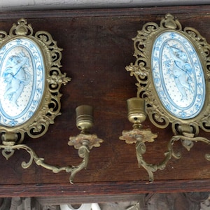 Pair antique french faience 19thc putti cherub plaques wall lights candle holder