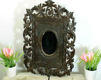 Antique black forest wood carved apothecary wall cabinet with mirror rare