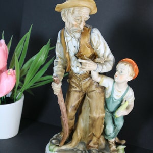 Vintage capodimonte porcelain statue group old young boy man