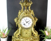 Belgian luppens marked mantel clock caryatid heads