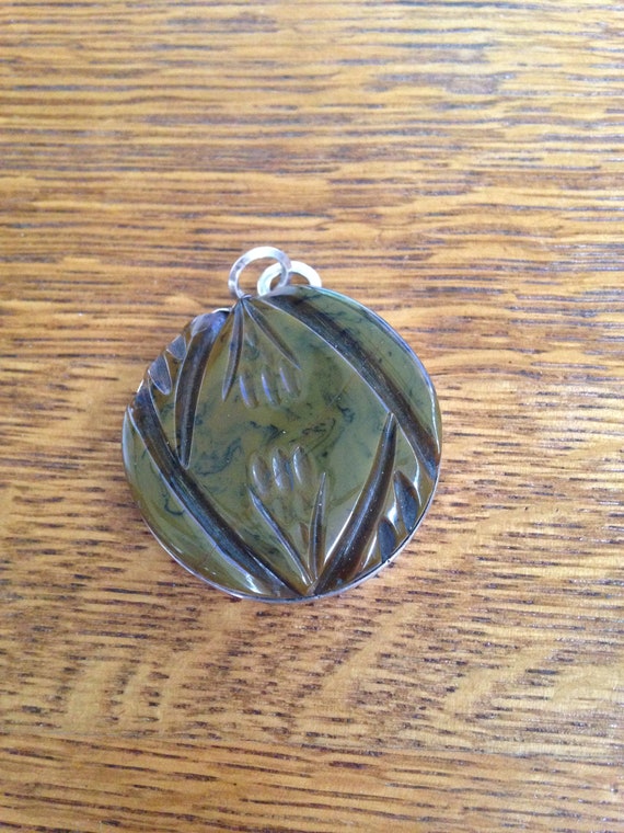 Carved Bakelite Sterling Silver Pendant