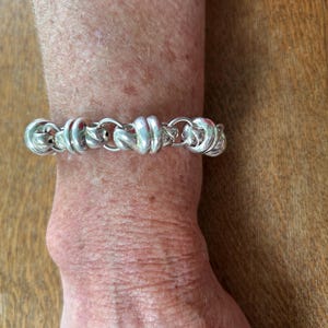 Sterling Silver Barrel Link Bracelet measuring approx 7 1/4” long and 1/2” wide, marked 925 BGL