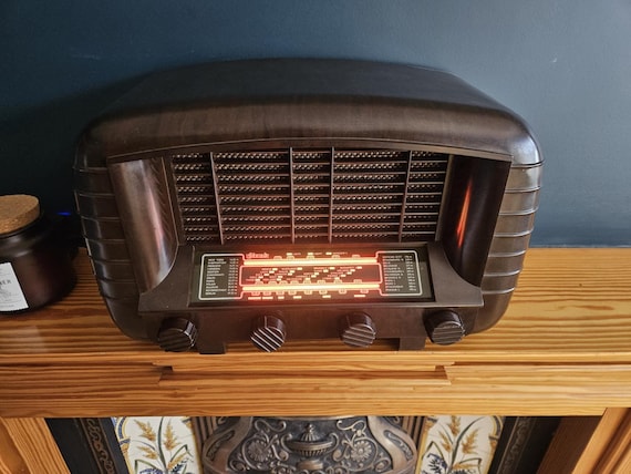 A genuine vintage Bakelite Strad radio gutted and reborn as a Bluetooth speaker — someone actually did the craft work to make a 1940s cabinet play your Spotify.