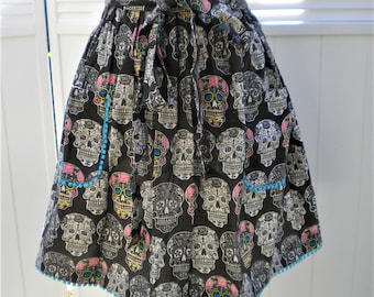 Sugar Skulls Half Apron, Pink, Turquoise and Green on Black with Turquoise Mini Ball Trim at Pockets and Hem, Halloween or Day of the Dead