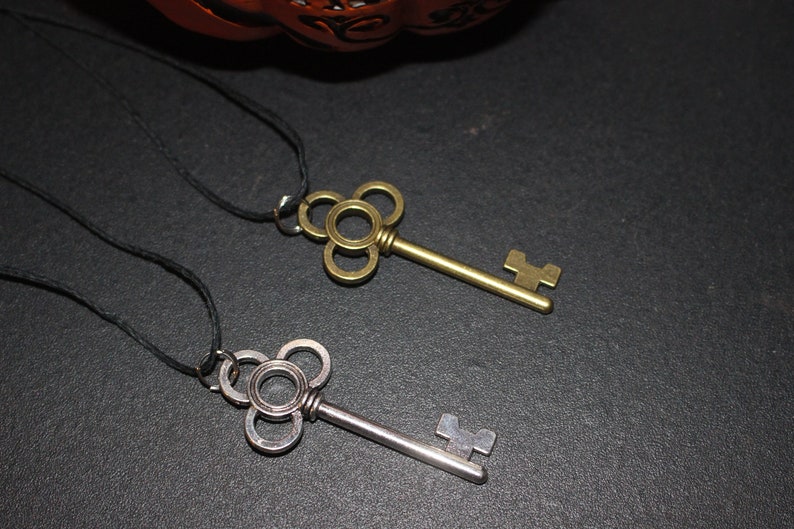 Silver and Bronze Key Pendant Necklaces