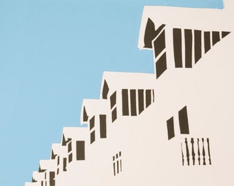 May include: A white building with black windows and a blue sky in the background. The building has a series of windows that are stacked on top of each other, creating a pattern.