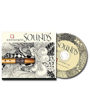 May include: A CD and a CD case with a black and white Zentangle design. The CD case has the word "SOUNDS" in black text and the word "zentangle" in red text. The CD has the word "SOUNDS" in black text and the website "zentangle.com" in black text.