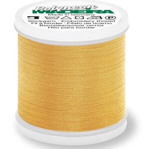May include: A spool of gold embroidery thread with the brand name "Polyneon" and the text "Made in Germany" on the label.