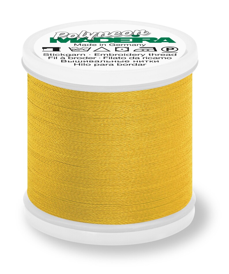 May include: A spool of yellow embroidery thread with the brand name "Polyneon Madeira" and the text "Made in Germany" on the label.