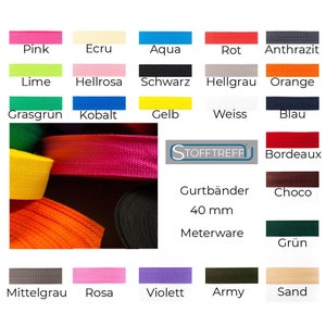 Könnte beinhalten: Eine Auswahl an Farben von 40 mm breitem Gurtband, darunter Pink, Ecru, Aqua, Rot, Anthrazit, Lime, Hellrosa, Schwarz, Hellgrau, Orange, Grasgrün, Kobalt, Gelb, Weiß, Blau, Bordeaux, Choco, Grün, Mittelgrau, Rosa, Violett, Army und Sand. Der Text "STOFFTREFF" und "Gurtbänder 40 mm Meterware" ist im Bild sichtbar.