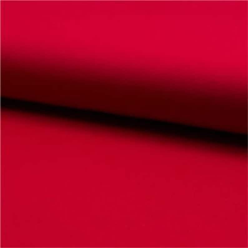 May include: Solid red fabric swatch. The fabric is smooth and has a slight sheen.
