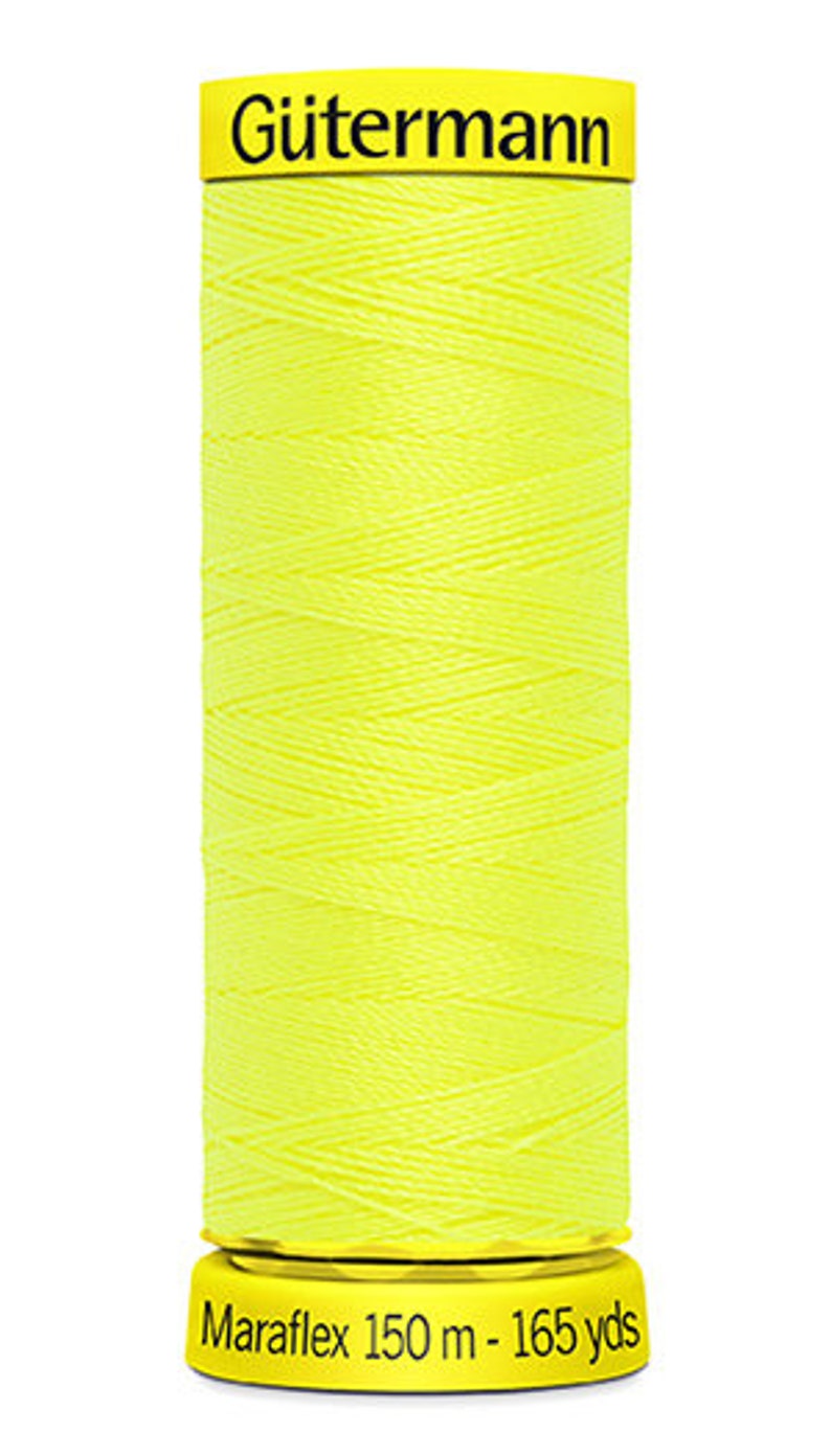 May include: A spool of bright yellow G&uuml;termann Maraflex thread, 150 meters or 165 yards.
