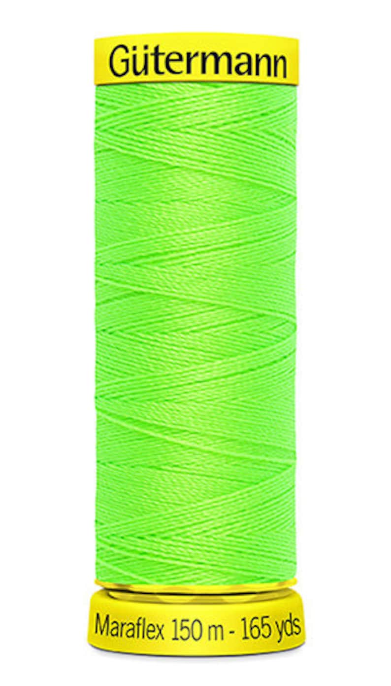 May include: A spool of bright green G&uuml;termann Maraflex thread, 150 meters or 165 yards.