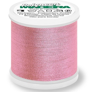 May include: A spool of pink embroidery thread labeled "Polyneon Madeira" with the text "Made in Germany" and "Stickgarn Embroidery thread".