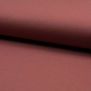 May include: A close-up of a solid, deep red fabric. The fabric has a smooth, slightly textured surface.