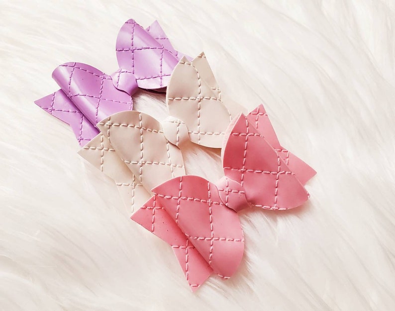 Quilted patent leather bow