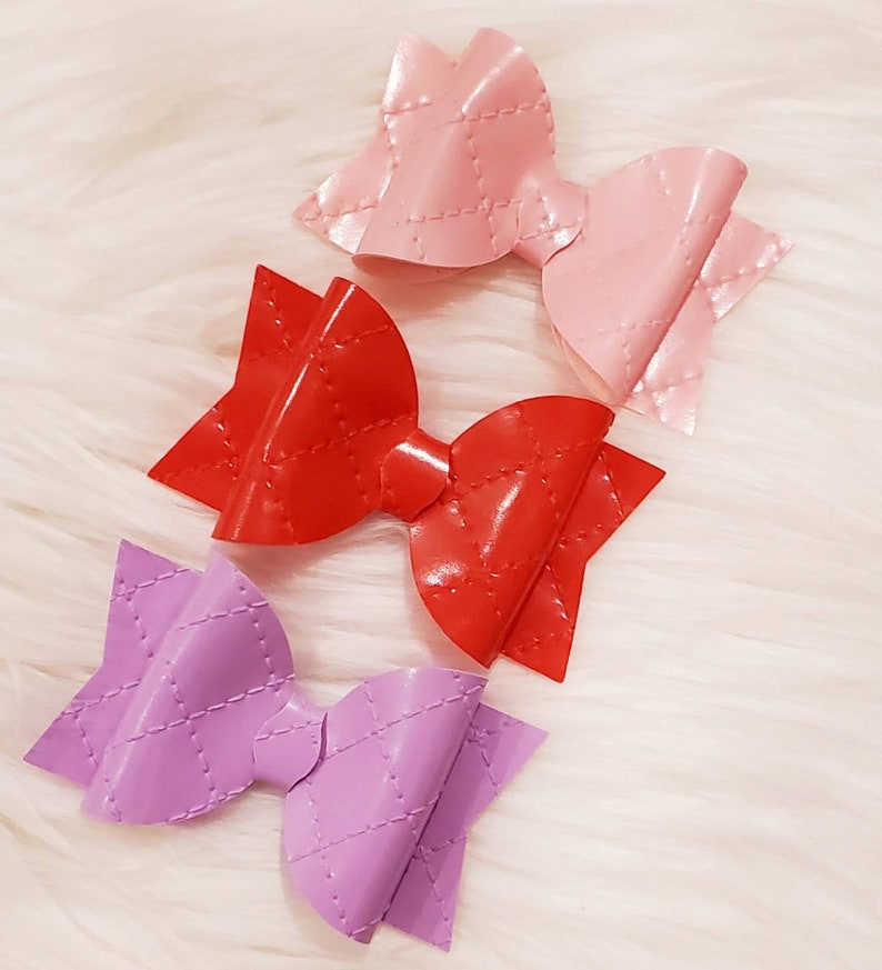 Quilted patent leather bow