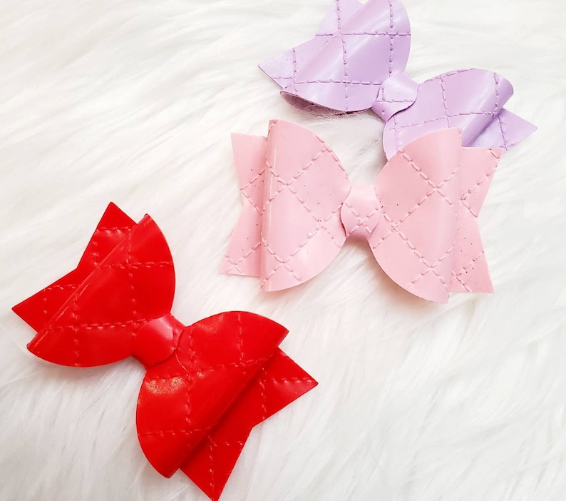 Quilted patent leather bow