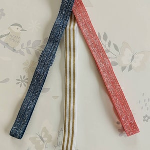 Bespoke handmade elastic headband by GigglesandHiccups. Over 60 designs to choose.