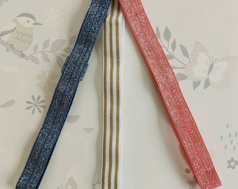 Bespoke handmade elastic headband by GigglesandHiccups. Over 60 designs to choose.