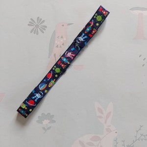 Bespoke Navy Space Themed Hearing Aid & CI Soft Elastic Headband for baby, toddler, teen and adult by GigglesandHiccups.