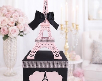 Centro de mesa de la Torre Eiffel para fiestas temáticas de París: quinceañeras, baby showers, despedidas de soltera, cumpleaños y compromisos. Rosa y negro brillante.
