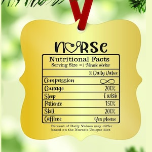 May include: Gold-colored Christmas ornament shaped like a nutrition facts label with the word "NURSE" at the top. The label lists "Compassion", "Courage", "Sleep", "Patience", "Skill", and "Caffiene" with humorous daily value percentages.