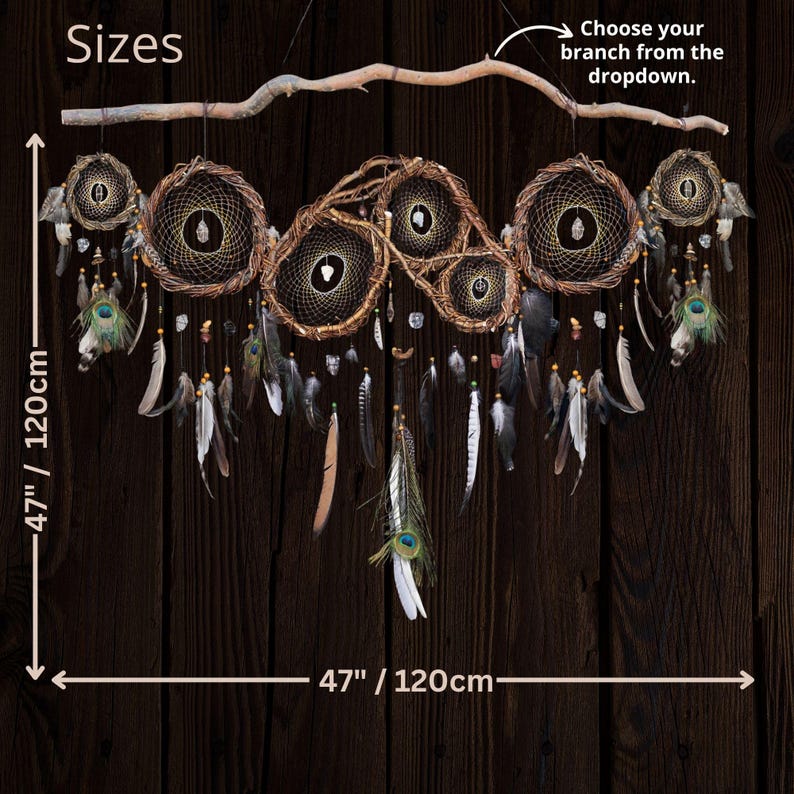 May include: A large wall hanging featuring five circular woven hoops suspended from a natural branch. The hoops contain intricate webbing, crystals, and dangling feathers, including peacock feathers. Text reads: Sizes, 47" / 120cm, Choose your branch from the dropdown.