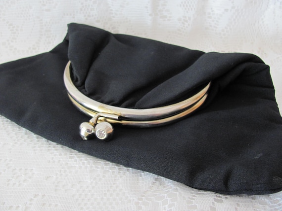 black fold over purse