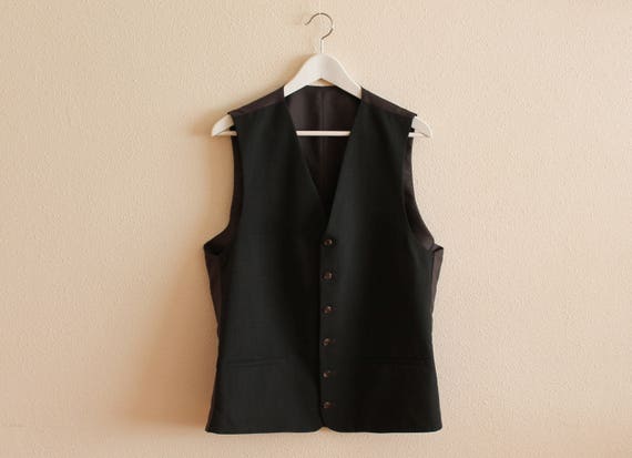 chaleco marron hombre