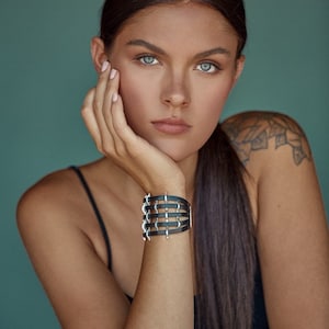 The Defender Bold and Edgy Statement Leather and Silver Cuff Bracelet