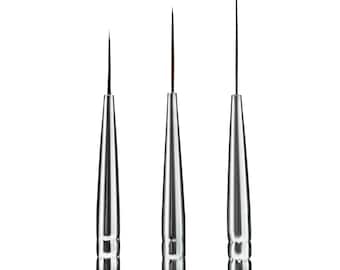 May include: Three fine tipped detail paint brushes with purple handles and silver metal ferrules.