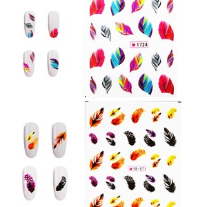 May include: Nail art stickers featuring colorful feather designs. The stickers include various feather patterns in shades of red, blue, yellow, and black. Some stickers are applied to white nail polish for display. The text "1724" and "YB-871" are visible.