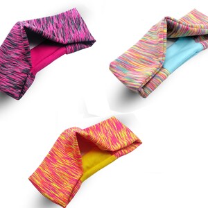 May include: Three colorful headbands with a patterned design. The headbands are made of a soft, stretchy material and are perfect for working out or running errands.