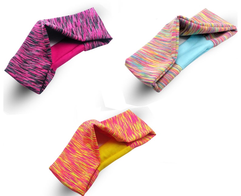 May include: Three colorful headbands with a patterned design. The headbands are made of a soft, stretchy material and are perfect for working out or running errands.