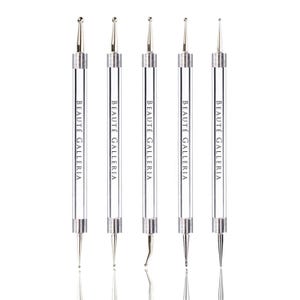 May include: Set of five silver nail art tools with different shaped tips. The tools are labeled "BEAUTE GALLERIA".