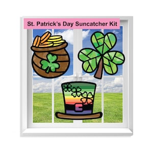 May include: St. Patrick's Day Suncatcher Kit with a pot of gold, a shamrock, and a leprechaun hat. The suncatchers are made of colorful stained glass.