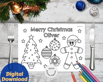 May include: A black and white printable placemat with a Christmas theme. It features a Christmas tree, baubles, a gingerbread man, and the text "Merry Christmas Oliver".