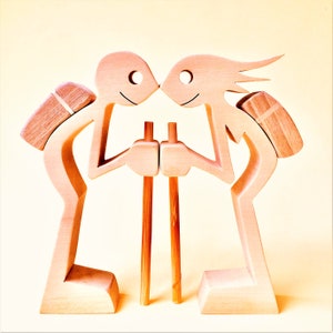 couple of backpackers; wood carving