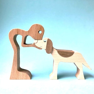 a man has a springer spaniel original wood sculpture 2virgule5d image 1