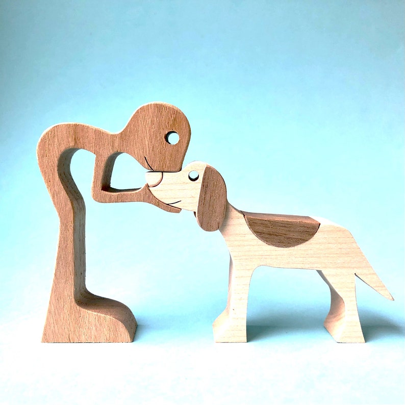 a man has a springer spaniel original wood sculpture 2virgule5d image 1