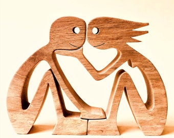 a woman a man; original wood sculpture 2comma5d