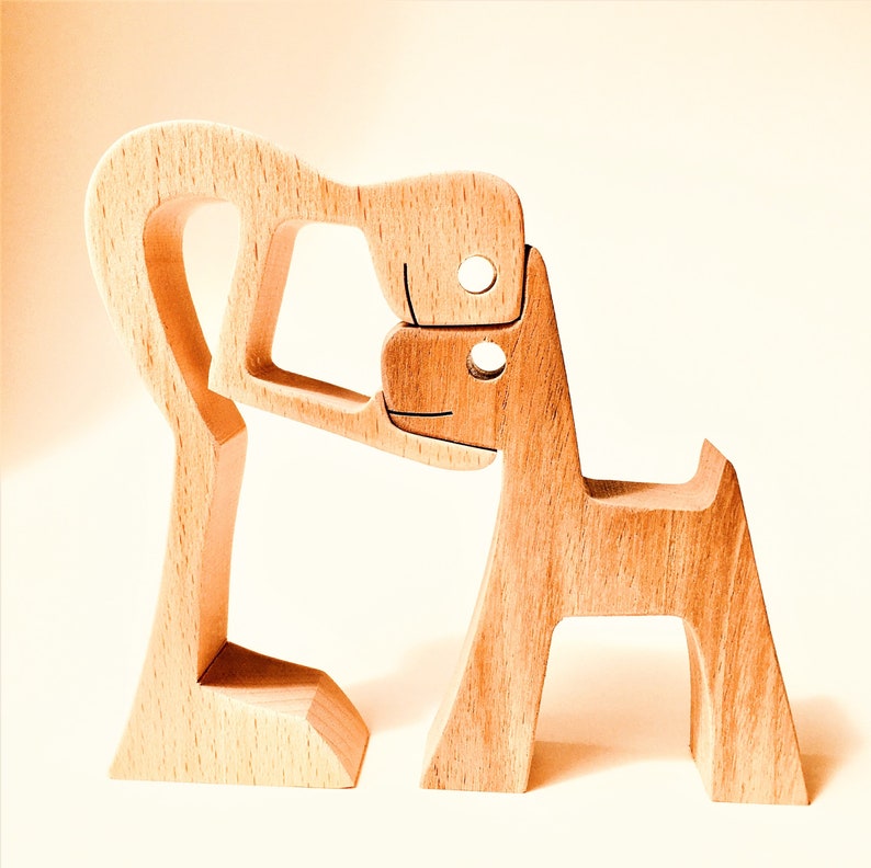 a man a dog the original; Original wood sculpture 2comma5d