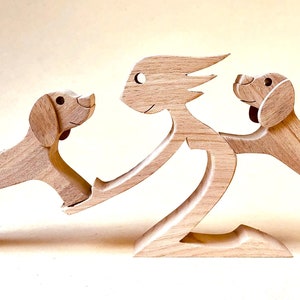 a woman two beagles; original wood sculpture 2virgule5d