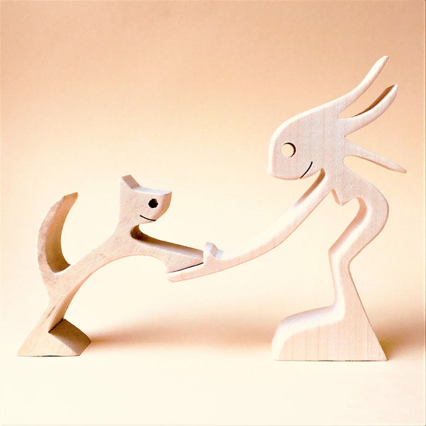 A woman and a cat, version 2, carved wood sculpture