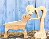 un homme un rottweiler ; sculpture bois originale 2virgule5d
