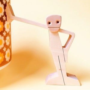 waiting; fretwork wood sculpture